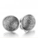 Icon The titanium cufflinks with a ball-shaped closure system are refined with gold and diamonds.